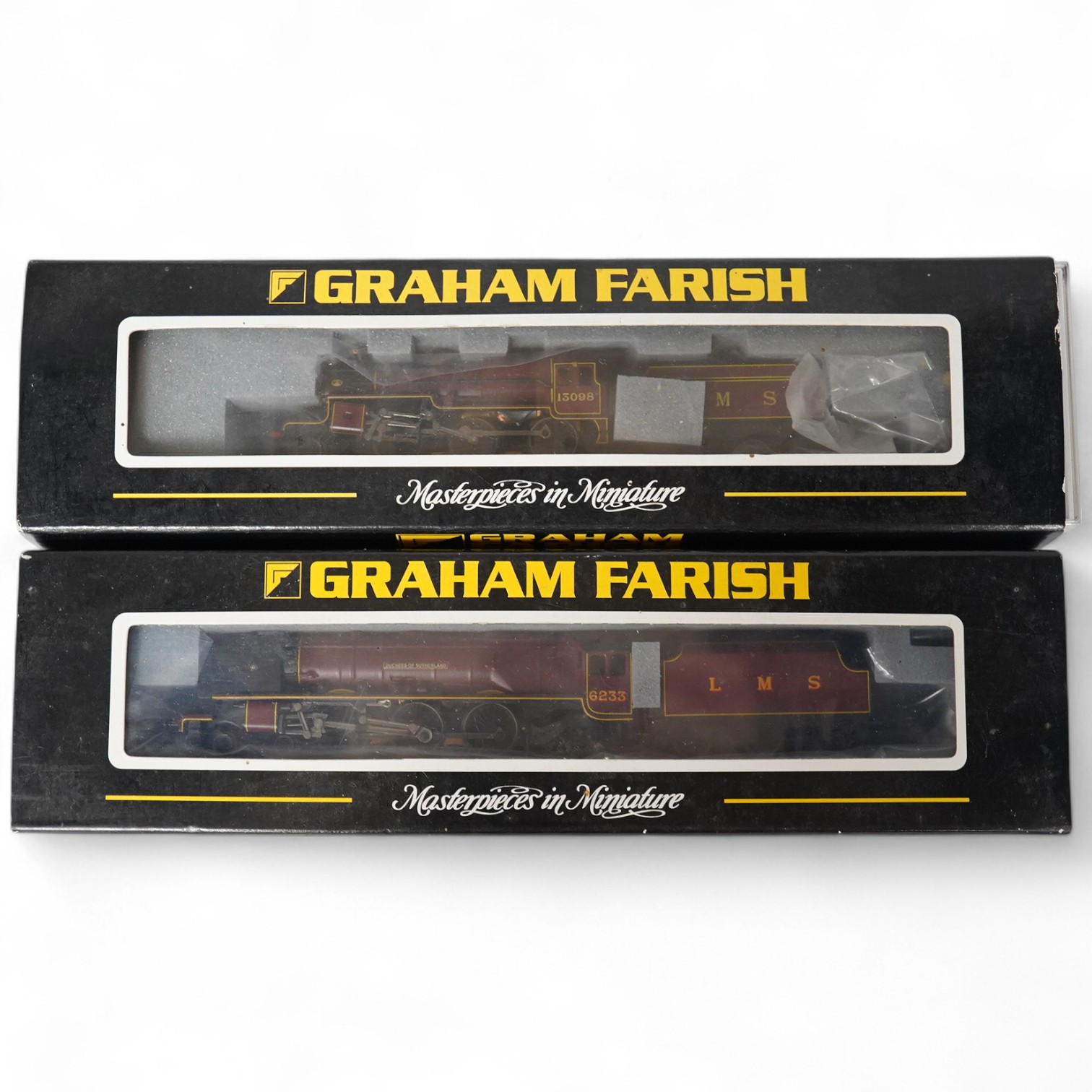 Two boxed Graham Farish N gauge railway LMS locomotives; Coronation Class Duchess of Sutherland 6233 (372-180) and a Midland Crab 13098 (372-226). Condition - good.